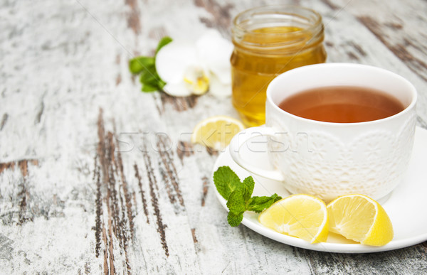 Cup of tea with lemon and honey Stock photo © Es75