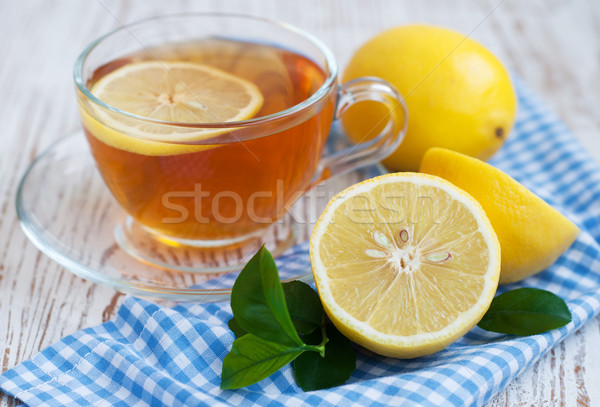 Tee Zitronenscheibe Teetasse Zitrone Holztisch Blatt Stock foto © Es75