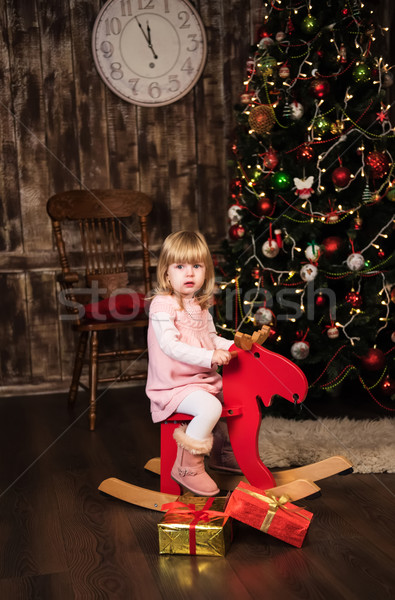 little girl on a toy horse Stock photo © Es75