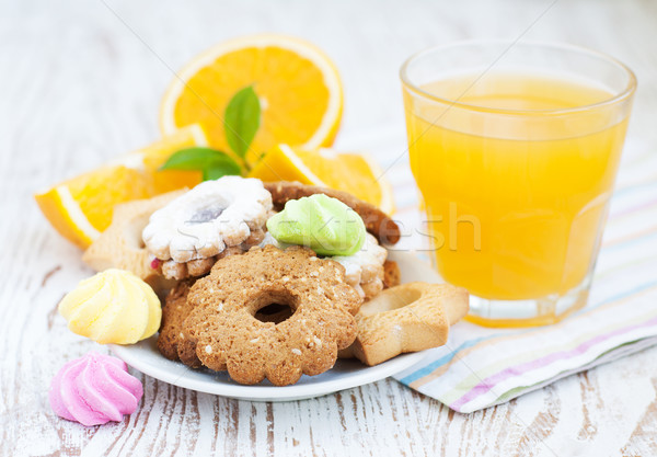 Succo d'arancia cookies legno frutta arancione bere Foto d'archivio © Es75