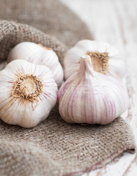 Sackleinen Sack Knoblauch Holz Pfeffer Hintergrund Stock foto © Es75