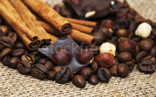 Coffee beans with cinnamon sticks and chocolate Stock photo © Es75