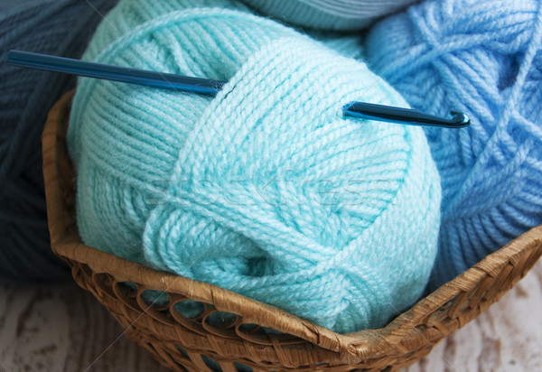 Stock photo: Crochet hook and knitting yarn