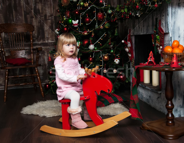 little girl on a toy horse Stock photo © Es75