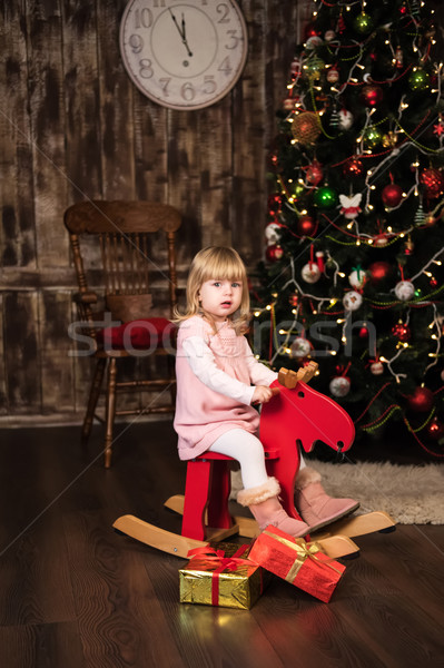 little girl on a toy horse Stock photo © Es75