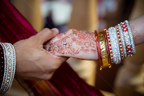 Groom holding brides hand Stock photo © esatphotography