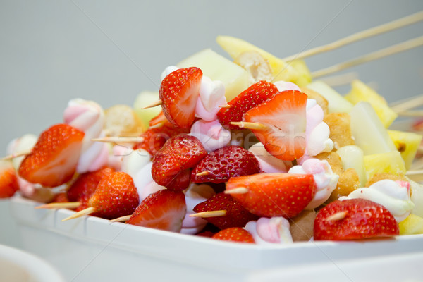 Strawberries stick Stock photo © esatphotography