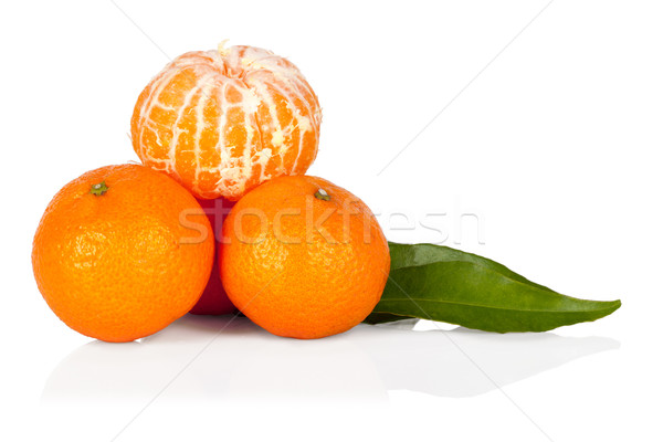 Fresh mandarine tangerine with leaves and segments isolated on w Stock photo © Escander81