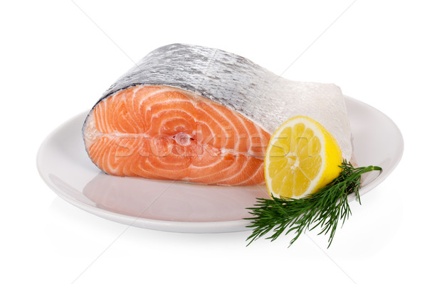 Raw steak of salmon on white plate isolated Stock photo © Escander81
