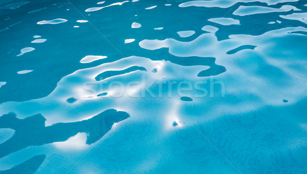 Clear blue water in swimming pool Stock photo © Escander81