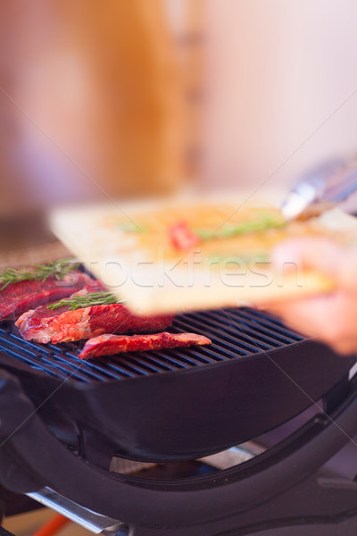 Closeup of steak fresh meat preparing on grill Stock photo © Escander81