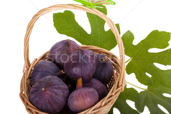 Busket of fresh figs with leaves isolated on white background Stock photo © Escander81
