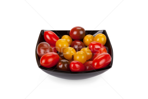 Tomates cerises noir plaque isolé blanche feuille [[stock_photo]] © Escander81