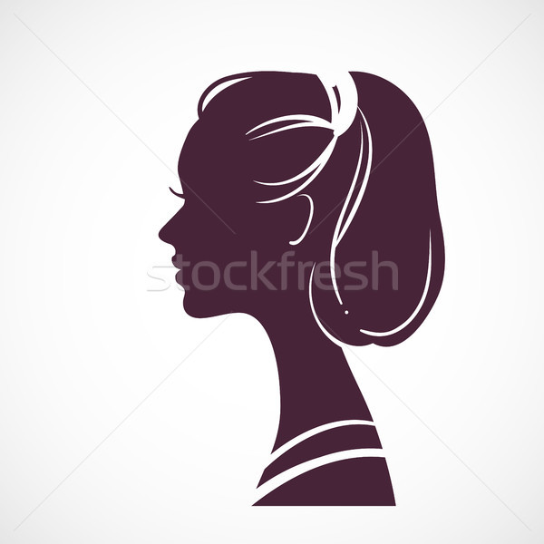 Women silhouette head with beautiful stylized haircut Stock photo © ESSL