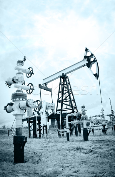 Pump jack and oilwell. Stock photo © EvgenyBashta