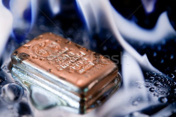 gold ingot and  flame Stock photo © EvgenyBashta