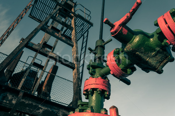 Group of wellhead. Oilfield with sand ground. Stock photo © EvgenyBashta