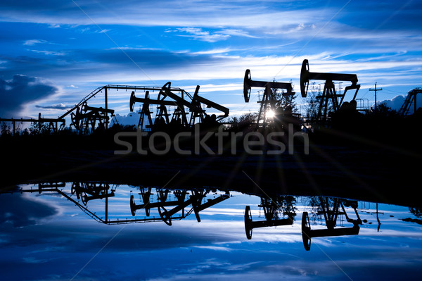 нефть насос группа закат небе синий Сток-фото © EvgenyBashta