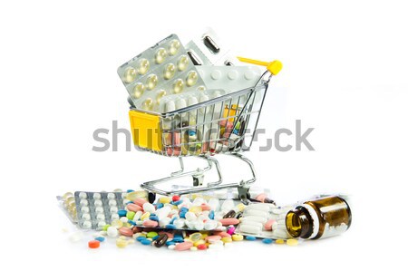 shopping cart full of pills isolated on white. Shopping cart wit Stock photo © EwaStudio