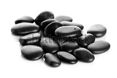 Black massage stones isolated. Stock photo © EwaStudio