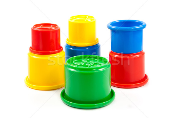 Colorful toys for kids. plastic cups on the white background Stock photo © EwaStudio