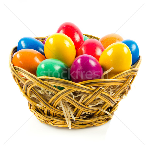 Stock photo: Easter eggs in a  basket