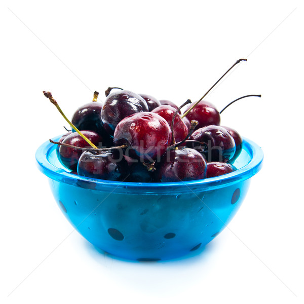Fresh cherries in bowl isolated on white Stock photo © EwaStudio
