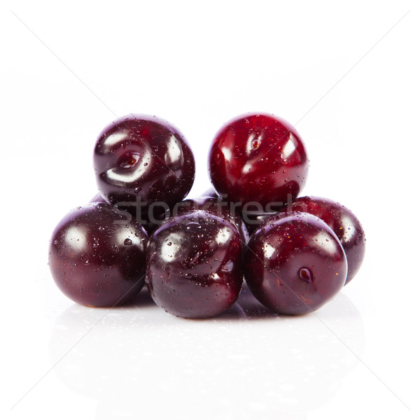 Red plum fruit isolated on white background.  Fresh ripe washed  Stock photo © EwaStudio