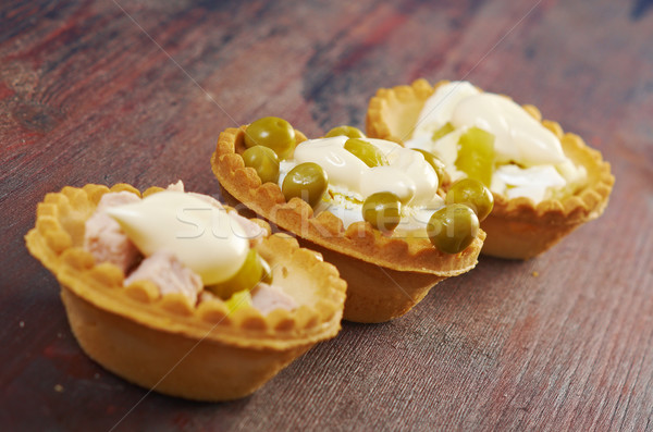 tartlet with salad on wooden board Stock photo © fanfo