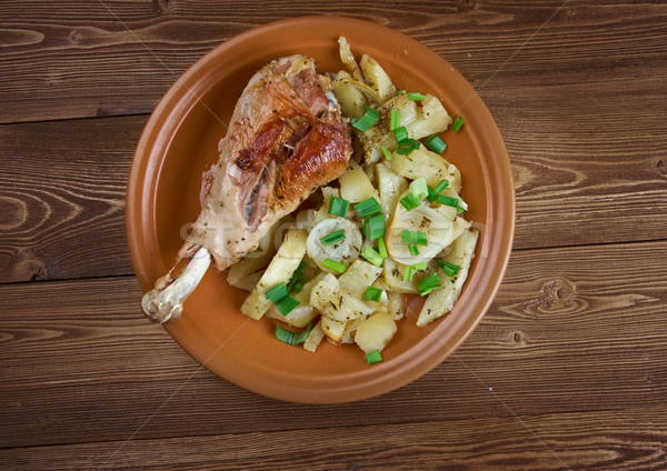 Turkey leg with baked  potatoes  Stock photo © fanfo