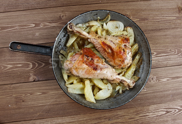 Turkey leg with baked  potatoes  Stock photo © fanfo