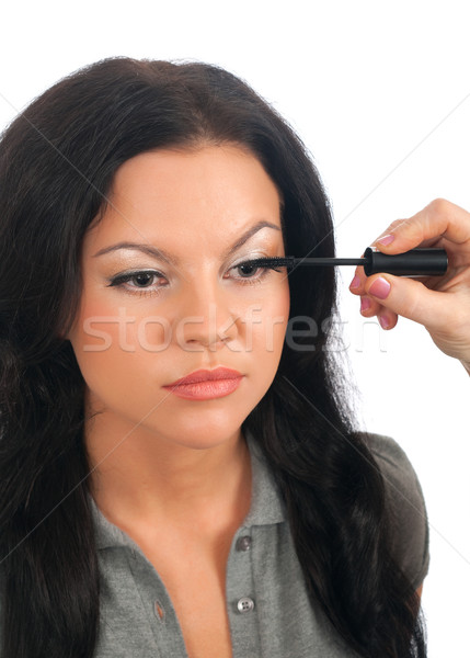 putting on models eye make up Stock photo © fanfo