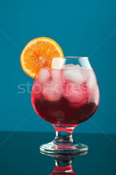 red coctail drink with ice cubs   Stock photo © fanfo