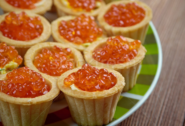    Tartlet with red caviar   . Stock photo © fanfo