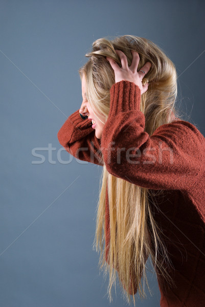 Fiatal szőke lány haj szürke kezek Stock fotó © fanfo