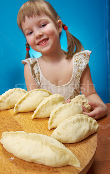  little girl kneading dough Stock photo © fanfo