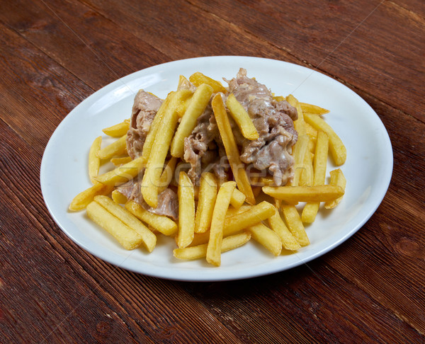 Slice pork  and french fries Stock photo © fanfo