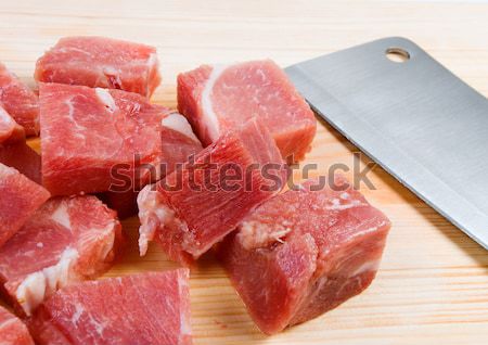 Chopping of meaton wooden board Stock photo © fanfo