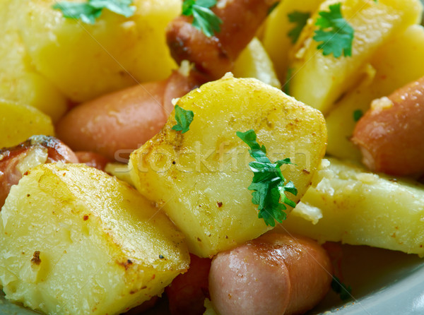 Stock photo: Finnish Fried potatoes with sausages