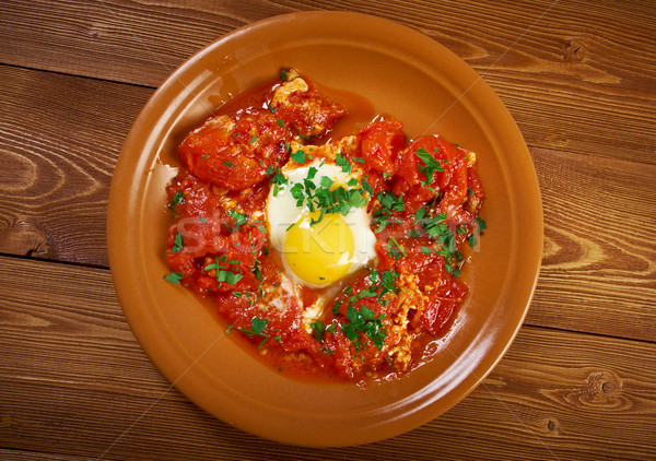 Prato ovos molho tomates cebolas Foto stock © fanfo