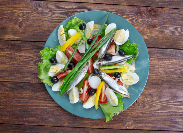 Nicoise Salad with anchovies Stock photo © fanfo
