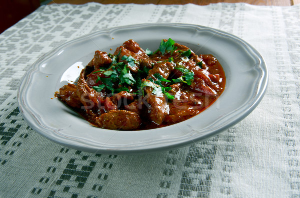 Magyar marhapörkölt közelkép főzés edény marhahús Stock fotó © fanfo