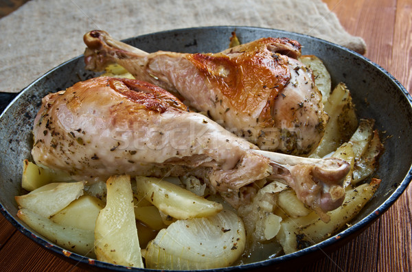 Turkey leg with baked  potatoes  Stock photo © fanfo