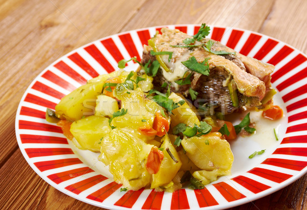 Baked trout with potatoes Stock photo © fanfo