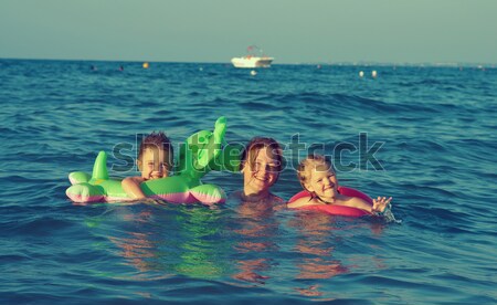 family in the waves Stock photo © fanfo