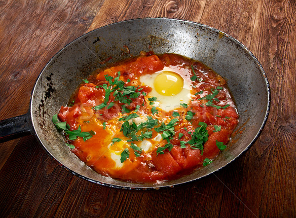 Prato ovos molho tomates cebolas Foto stock © fanfo