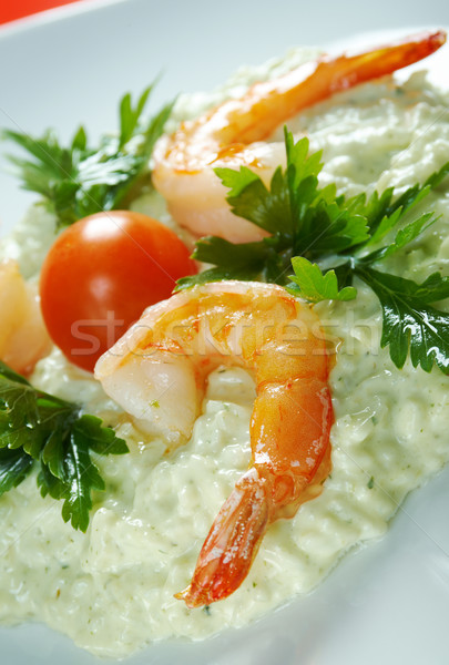 Delicious italian risotto with shrimps Stock photo © fanfo
