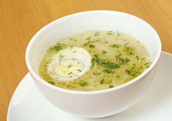 Stock photo: Chicken broth with dill and egg.
