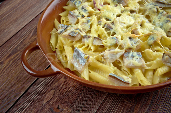 Baked pasta penne with mackerel Stock photo © fanfo