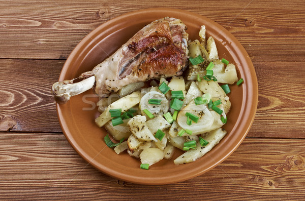 Turkey leg with baked  potatoes  Stock photo © fanfo